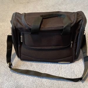 Bob Mackie tote/ small carry on. Handles or shoulder strap feet. new never used